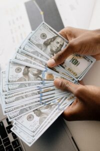 Voluntary repossession: many 100-dollar bills