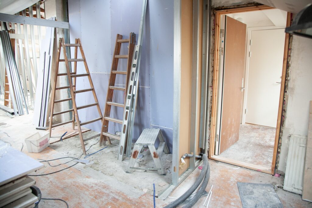 How To Get An FHA Construction Loan: a house undergoing renovation